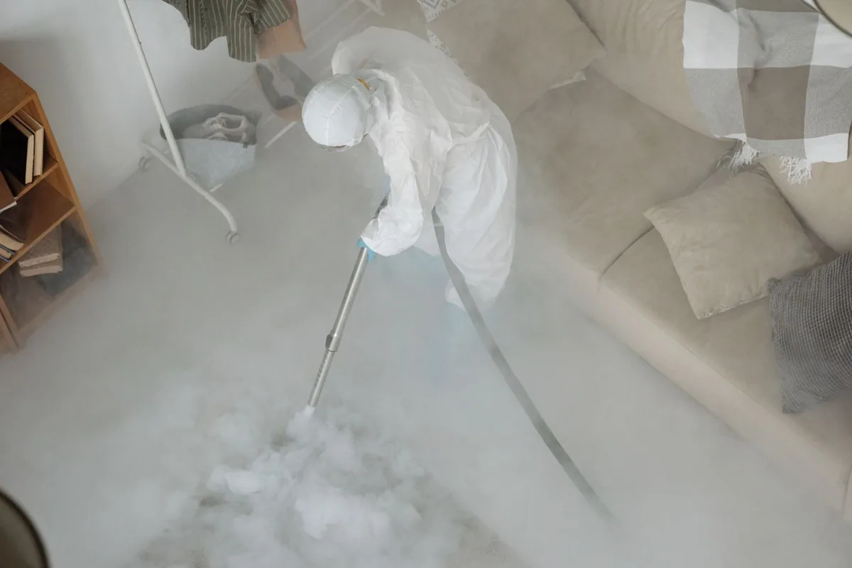 Biohazard cleanup technician in protective equipment, Highlands Ranch, CO